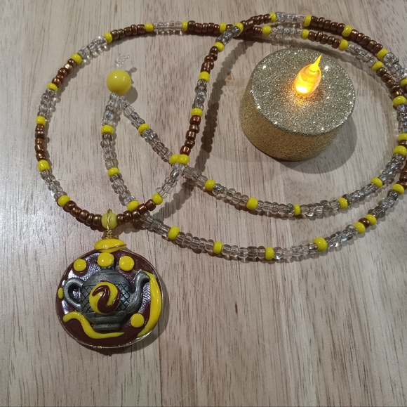 Magical Teapot Talisman in Brown and yellow emblem necklace - Picture 2 of 5